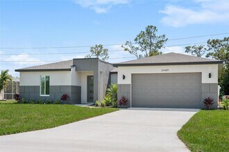 24489 SW Kingsway Cir in Lake Suzy, FL - Building Photo - Building Photo