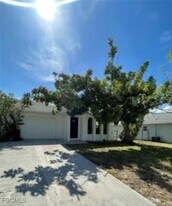 3309 SW Santa Barbara Pl in Cape Coral, FL - Building Photo
