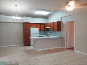 921 Lyons Rd-Unit -3206 in Coconut Creek, FL - Building Photo - Building Photo