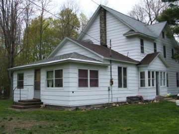 218 N Baldwin St in Whitehall, MI - Foto de edificio - Building Photo