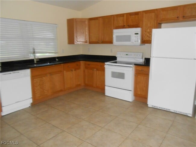 924 Hollister Ave in Lehigh Acres, FL - Building Photo - Building Photo