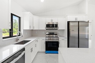 1061 Butler St E in Lehigh Acres, FL - Building Photo - Building Photo