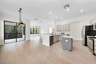 1248 Carpazi Ct in Naples, FL - Building Photo - Building Photo