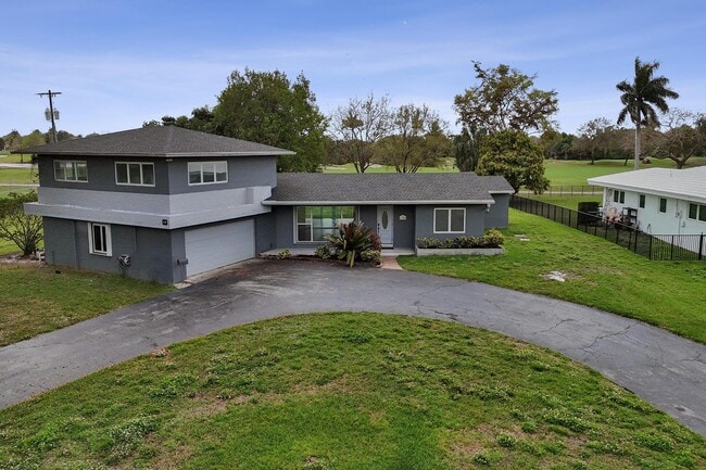 6700 E Tropical Way in Plantation, FL - Building Photo - Building Photo