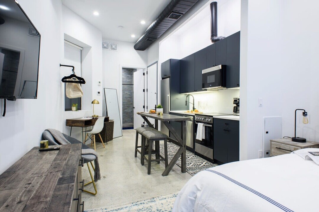 77 E 3rd St in New York, NY - Building Photo