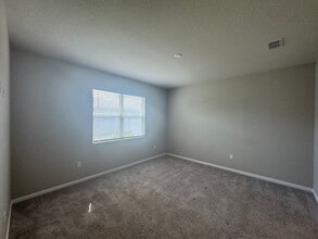 5089 Meadow Song Dr in Okahumpka, FL - Building Photo - Building Photo