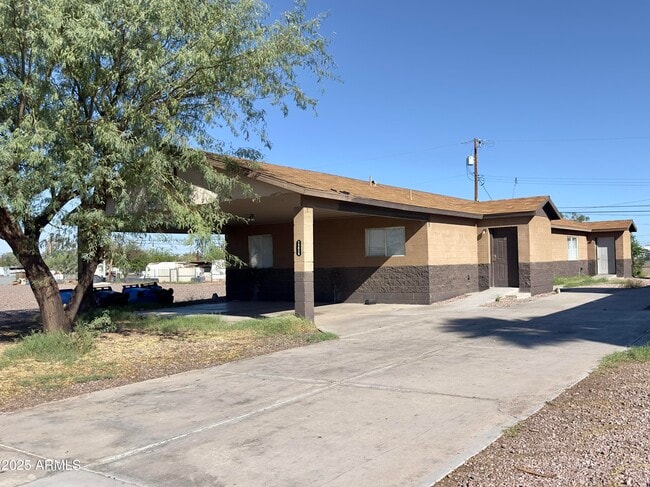 property at 1228 E Apache St