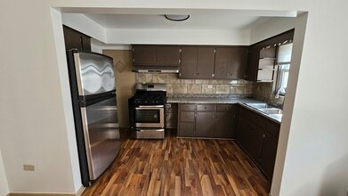 2333 N Mango Ave, Unit 1R in Chicago, IL - Building Photo - Building Photo