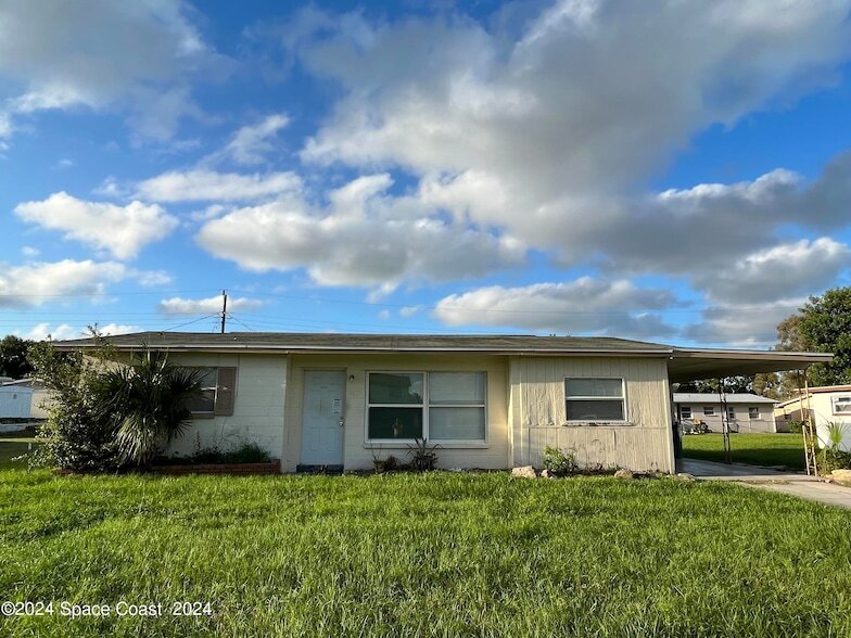 360 Schoolhouse Ln, Unit 127 in Merritt Island, FL - Building Photo