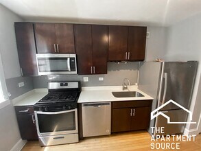 4103 W Nelson St, Unit 1 in Chicago, IL - Foto de edificio - Building Photo