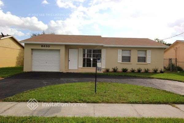 property at 6630 NW 24th Ct