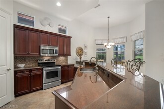 6476 Caldecott Dr in Naples, FL - Building Photo - Building Photo