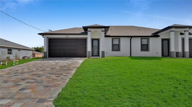 1121 Hightower Ave S in Lehigh Acres, FL - Building Photo - Building Photo