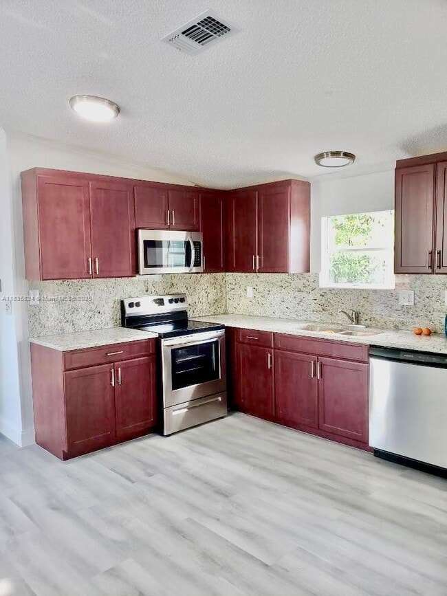 property at 220 NE 12th Ave