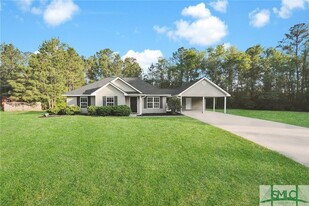 396 Abbey Dr in Richmond Hill, GA - Building Photo
