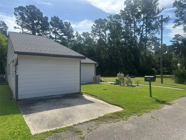 12423 Woodlake Ln in Pinehurst, TX - Building Photo - Building Photo