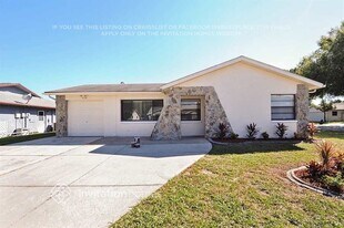 4128 Gray Squirrel Ln, Unit 1-408 in New Port Richey, FL - Building Photo