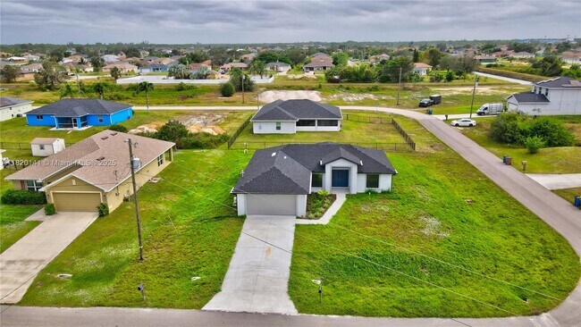 1002 Atherton Ave in Lehigh Acres, FL - Building Photo - Building Photo