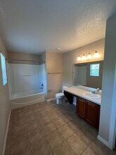 Avalon Park corner end Townhome featuring  in Orlando, FL - Building Photo - Building Photo