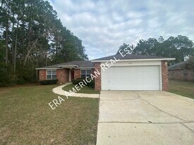 7418 Woodmont Rd in Navarre, FL - Building Photo