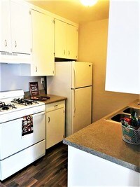 Upgraded Kitchen - Fjc Apartments in Warrensburg, Missouri