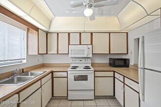 3799 S Banana River Blvd, Unit 505 in Cocoa Beach, FL - Foto de edificio - Building Photo