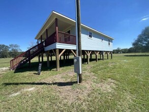 838 Cypress Lakes Cir in Cleveland, TX - Building Photo - Building Photo