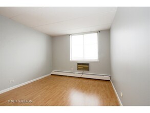 225 S Rohlwing Rd, Unit 612 in Palatine, IL - Foto de edificio - Building Photo