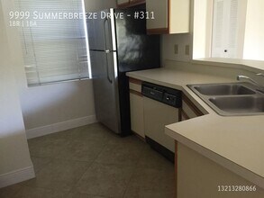 9999 Summerbreeze Dr in Sunrise, FL - Building Photo - Building Photo
