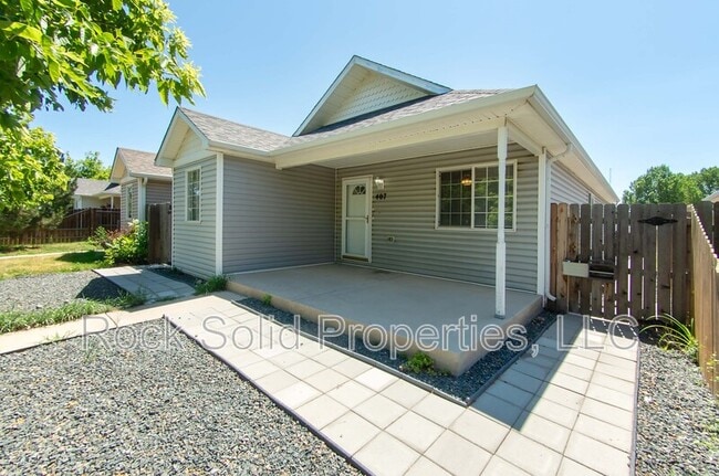 property at 407 E 5th St