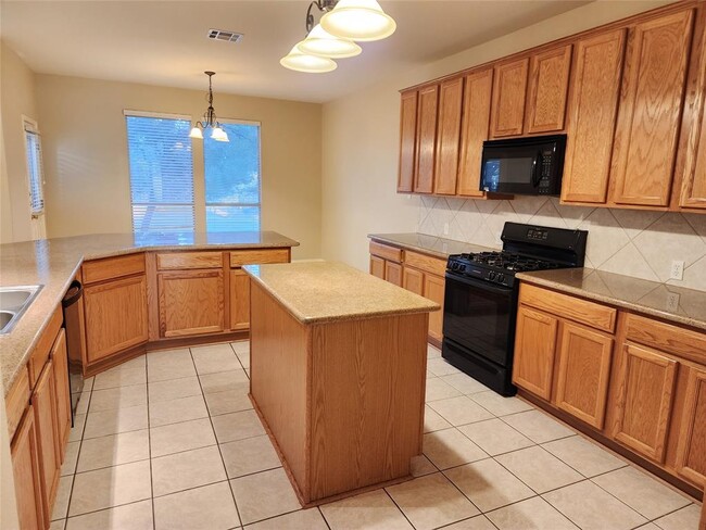 property at 3726 Harvey Penick Dr