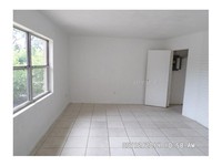 1811 Hacienda Way in Holiday, FL - Foto de edificio - Building Photo