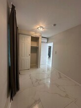 1427 E 76th St in Los Angeles, CA - Building Photo - Building Photo