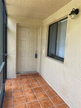 360 Racquet Club Rd in Weston, FL - Building Photo - Building Photo