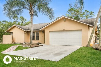 17413 42nd Rd N in The Acreage, FL - Building Photo - Building Photo