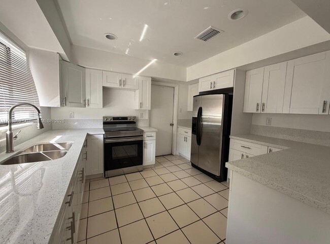 property at 2817 NW 8th St