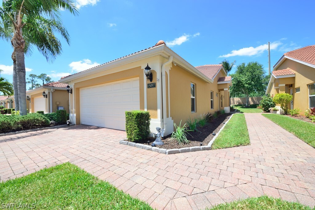 15097 Cortona Way in Naples, FL - Building Photo