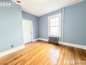 22-24 Everett Sq. Unit 1, Unit 1 in Boston, MA - Foto de edificio - Building Photo