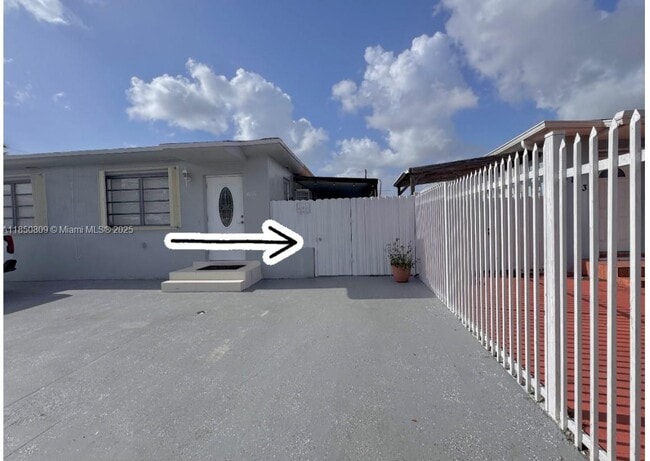 property at 4885 NW 4th St