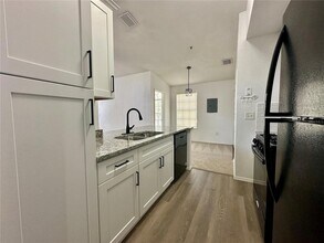 1606 Columbia Arms Cir, Unit 224 in Kissimmee, FL - Building Photo - Building Photo