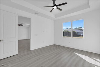 1034 Chiquita Blvd N in Cape Coral, FL - Foto de edificio - Building Photo