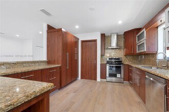 8951 Byron Ave in Surfside, FL - Building Photo - Building Photo