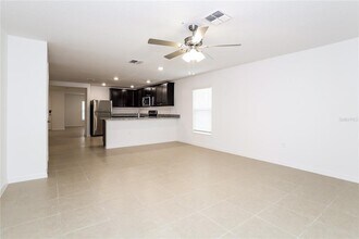 1677 Hideaway Flat St in Mascotte, FL - Building Photo - Building Photo