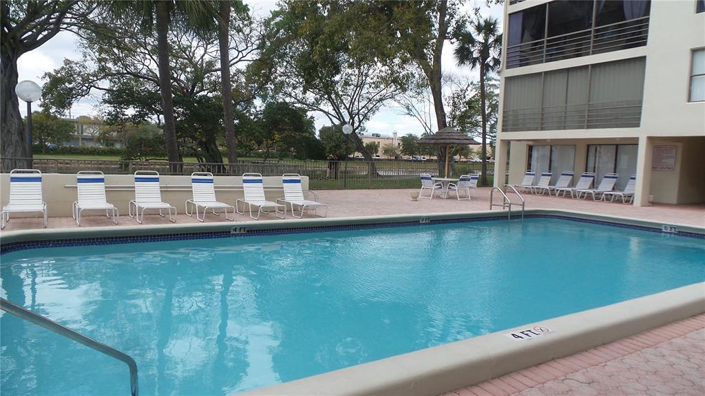 2310 S Cypress Bend Dr, Unit 201 in Pompano Beach, FL - Building Photo