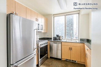 561 10th Ave, Unit SI FL21-ID2084 in New York, NY - Foto de edificio - Building Photo