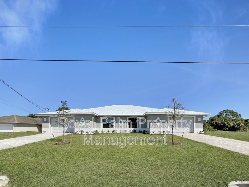 122 Ivan Ave S in Lehigh Acres, FL - Building Photo