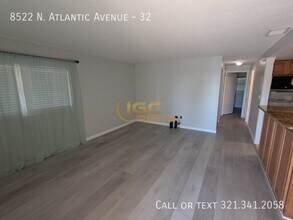 8522 N Atlantic Ave in Cape Canaveral, FL - Building Photo - Building Photo