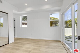10828 Hesby St in Los Angeles, CA - Building Photo - Building Photo
