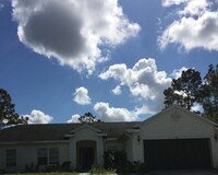 123 Carmelite Ave NW in Palm Bay, FL - Building Photo - Building Photo