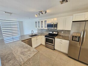 9944 Costa Del Sol Blvd in Doral, FL - Building Photo - Building Photo